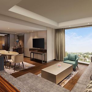 Presidential Suite Club Lounge Access Cocktail Hours from 6PM-8PM 1-way Airport Transfer 1 King Bed